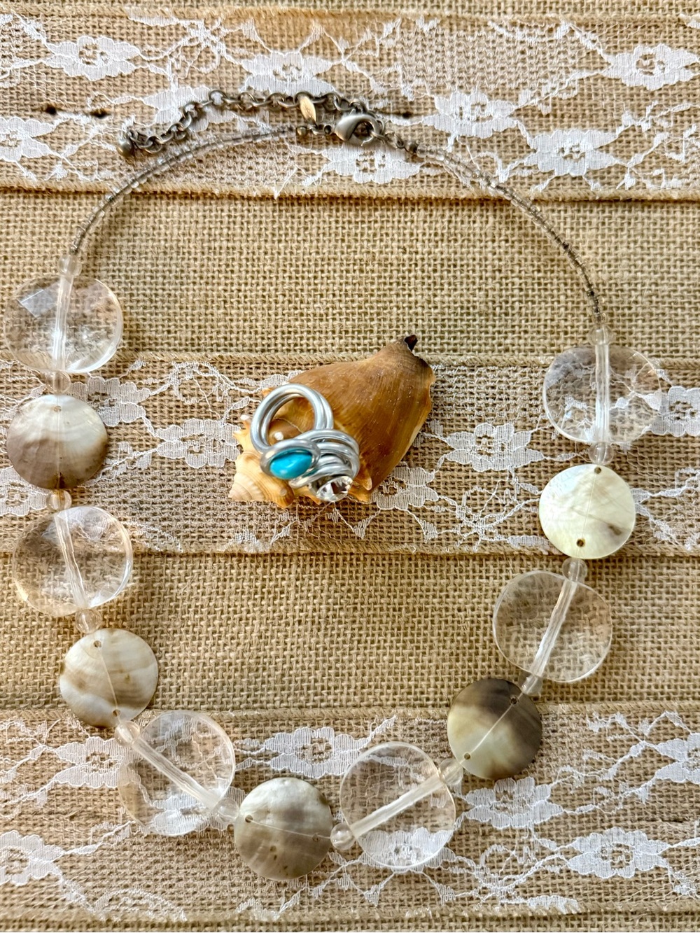 Fashion Jewelry Clear Bead Necklace with Cream Shell Discs and Turquoise Accent